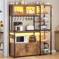 Itaar Bakers Rack with Power Outlet and LED Light, 45.3 Inch Farmhouse Coffee Bar Cabinet, Kitchen Microwave Stand with Storage, Glass Cabinet, Goblet Holder and 8 Hooks (Rustic Brown)